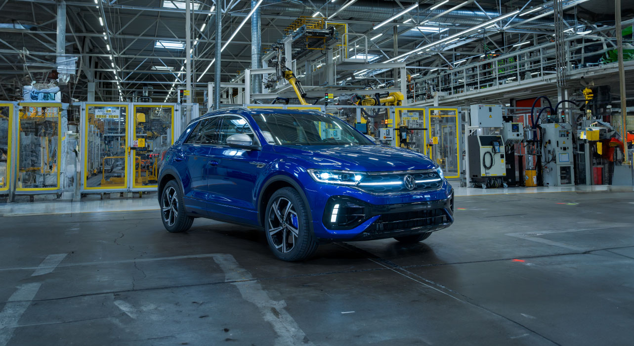 Blue car in a factory
